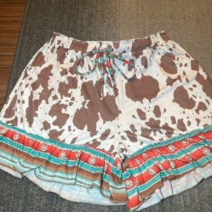 Grace & Emma Cow Print and Serape Ruffled Shorts